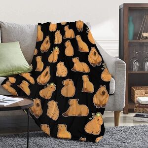 Cozy 40” x 60” capybara blanket and plush